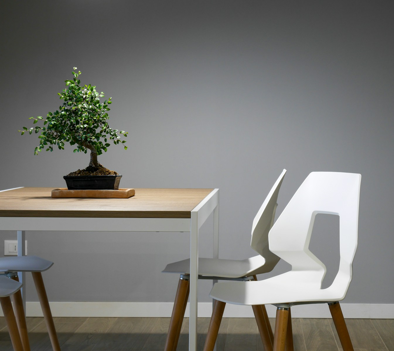 white and brown wooden table and chair set